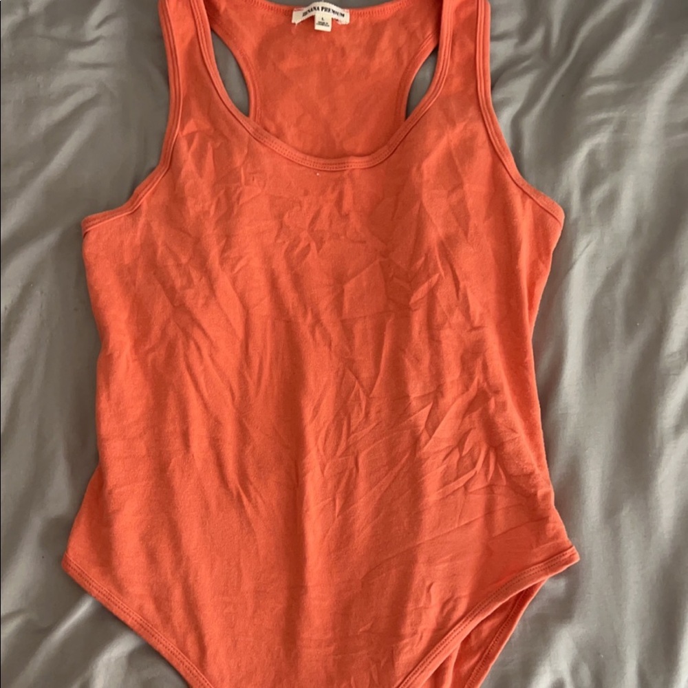 Orange body suit